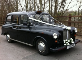 Classic Black London Taxi for weddings in Cardiff
