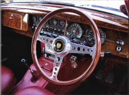 Red 1964 Jaguar wedding car for hire in Hereford