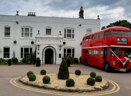 Red double deck bus for weddings in Oxford